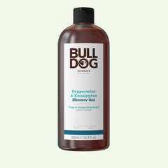 A 500 ml bottle of Peppermint & Eucalyptus Shower Gel features a black cap, white label, blue text, and a natural fragrance for an invigorating mens cleanse.