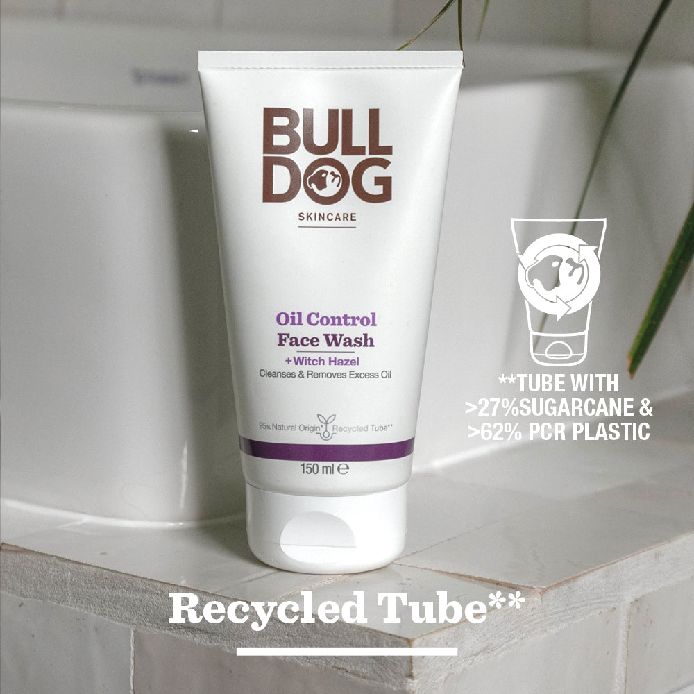 A tube from the Oil Control Skincare Bundle for oily skin sits on a bathroom counter. The text notes it contains over 27% sugarcane and 62% recycled plastic, with Recycled Tube printed at the bottom.
