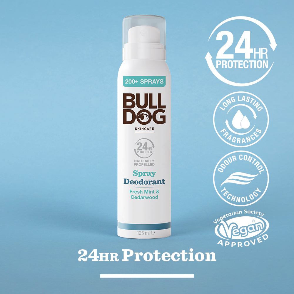 A can of Fresh Mint & Cedarwood Spray Deodorant stands upright on a blue background. This vegan deodorant provides 24-hour odour protection and features natural origin ingredients with a refreshing mint and cedarwood scent.