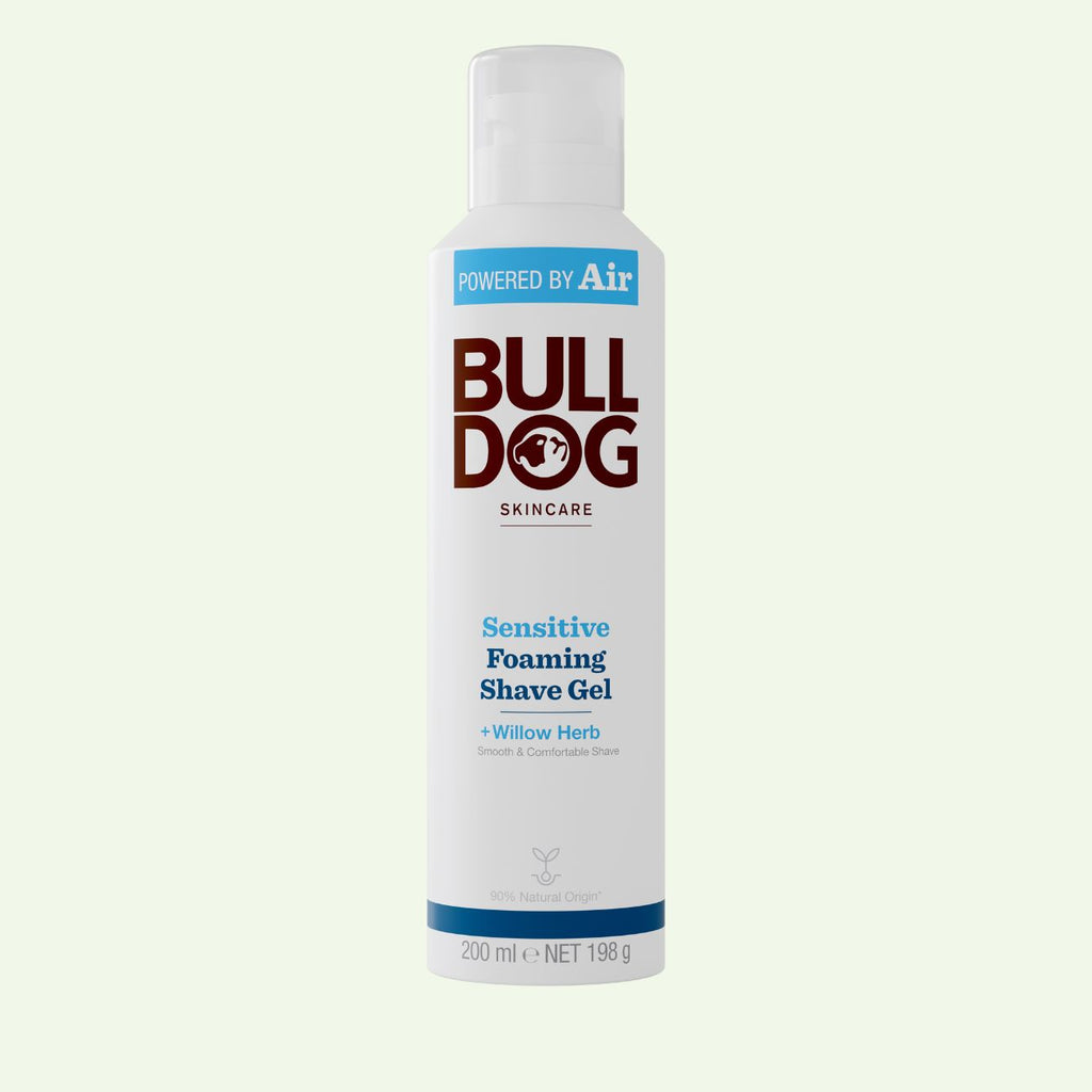 A white can of Sensitive Foaming Shave Gel with blue and brown text, featuring the Bulldog logo and details about willow herb, baobab oil, and natural origin ingredients for sensitive skin.