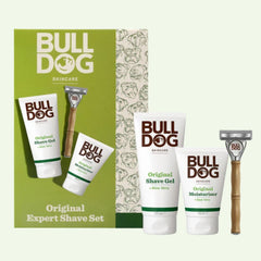 The Expert Shave Trio, ideal as a mens gift, features Original Shave Gel, Moisturiser, and a razor with a wooden handle, all presented in the product’s box packaging.