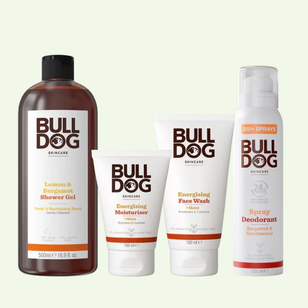 The Energising Spray Deodorant Bundle features four Bulldog Skincare products with sleek white packaging and brown and orange text, displayed against a plain light background.
