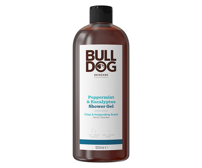 A 500ml clear plastic bottle of Peppermint & Eucalyptus Shower Gel features a black cap, white label, and blue text. The label highlights its crisp natural fragrance and invigorating scent for men.